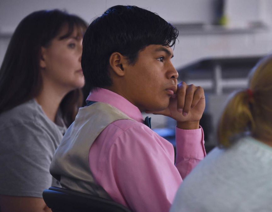 Business student engaged in classroom learning at Pensacola State College.