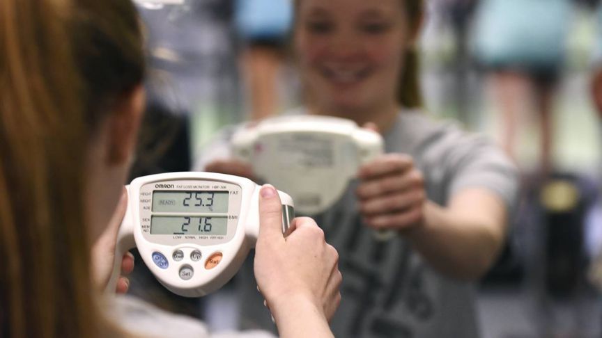 Heart rate monitoring in physical education class at Pensacola State College.