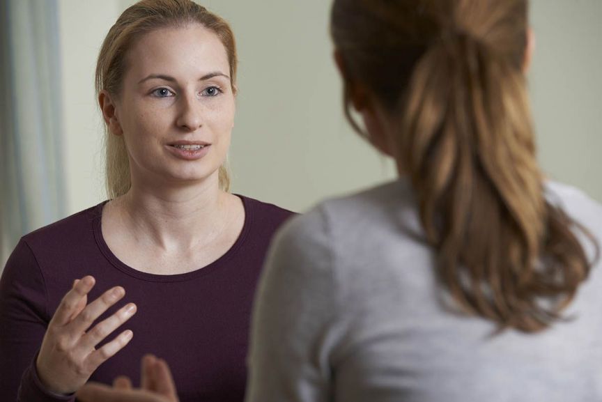 Psychology counseling session with a student and counselor at Pensacola State College for mental hea.