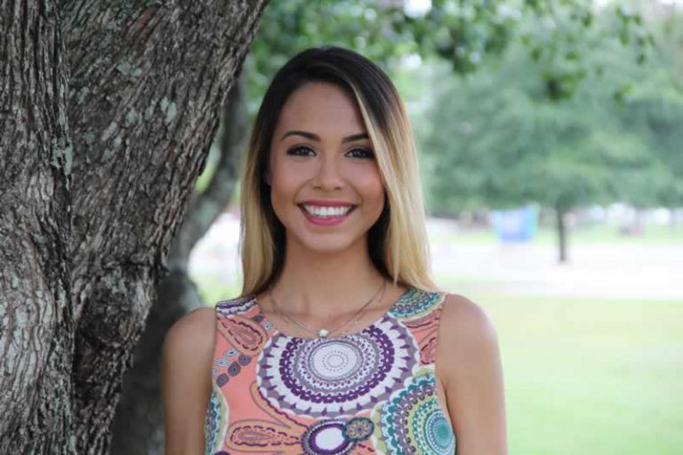 Student leader elected as Pensacola State College SGA president at a campus event.