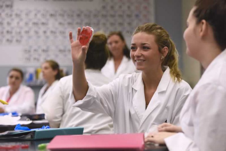 Student participating in hands-on science education at Pensacola State College.