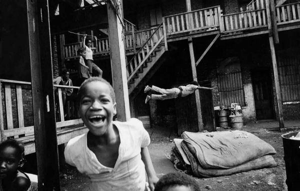 decorative image of 0126-Art-Shay_Backyard-Olympics-2 , PSC Permanent Collection on display at Switzer Gallery Jan. 30 – March 10 2017-02-03 12:23:57