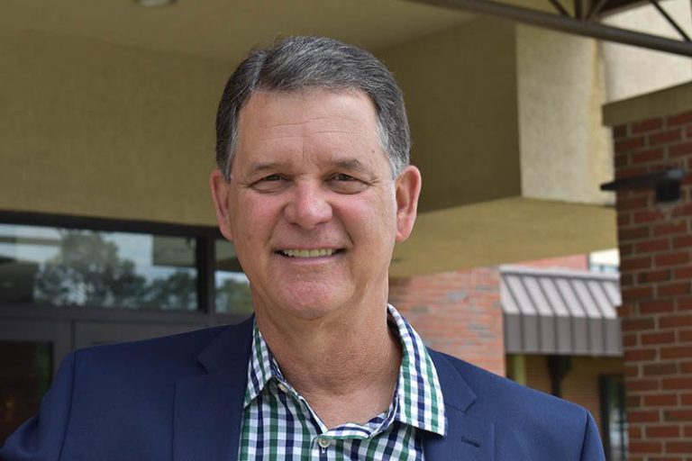 Celebrating Pensacola State's athletic director's induction into the FCSAA Hall of Fame for outstand.