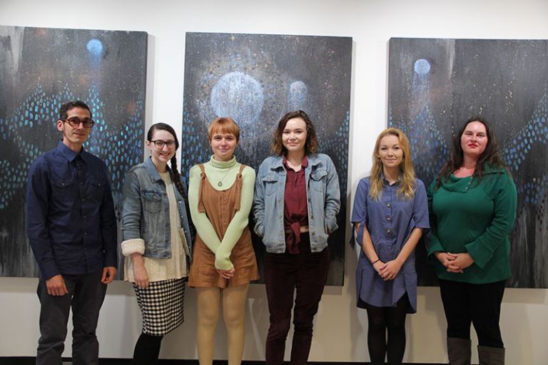 Group of six students and faculty at Pensacola State College art exhibit honoring 2018 Walter F. Spa.