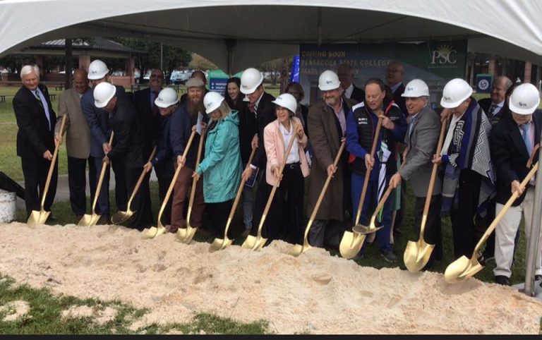 Group of officials and community leaders at groundbreaking for Pensacola State College STEM building.