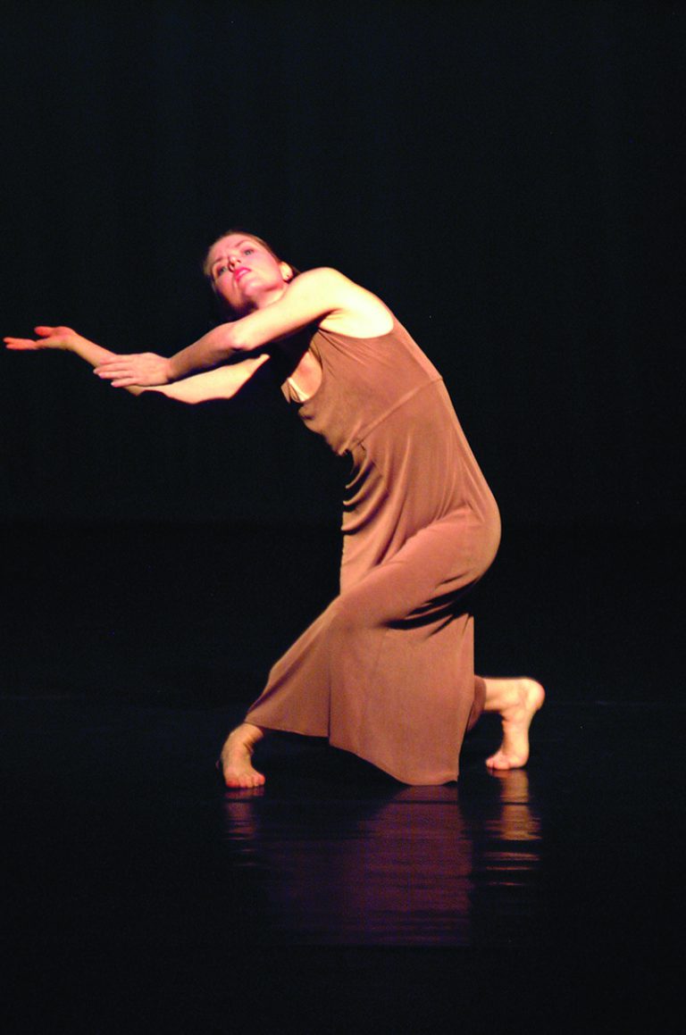 Elegant dancer performing contemporary dance at Pensacola State College.