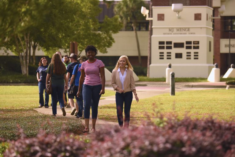 Students registering for summer and fall classes at Pensacola State College campus.
