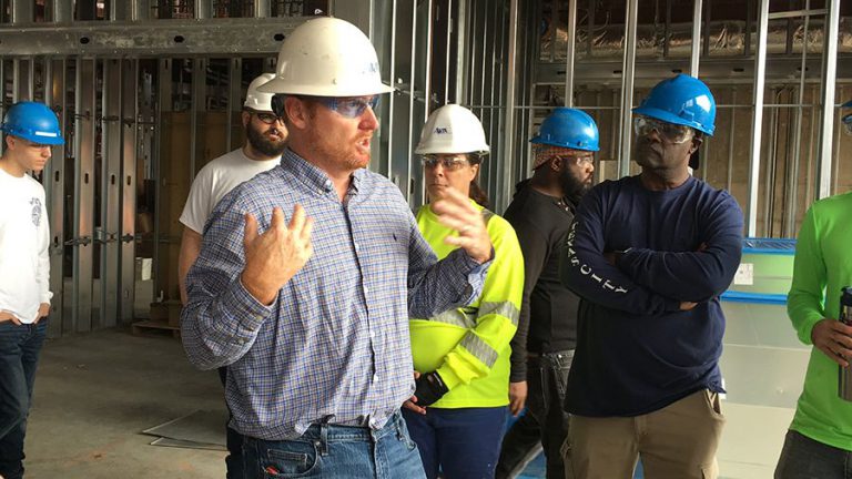 Construction site tour of Pensacola State College STEM building for students and faculty.