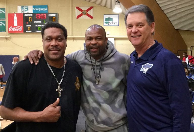 Celebrating former college basketball champion's return to Pensacola State College.