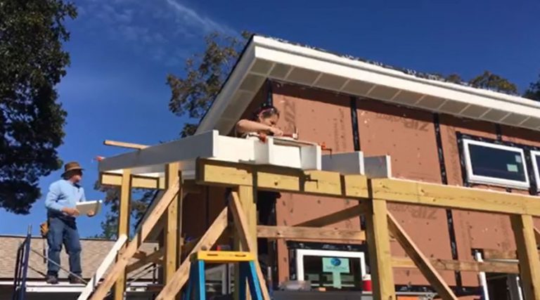 Construction of a small, sustainable home by Pensacola State College students in downtown Pensacola.