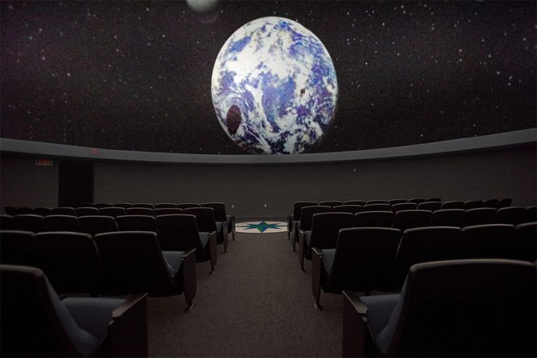 Planetarium theater showcasing Earth projection for educational and entertainment purposes.