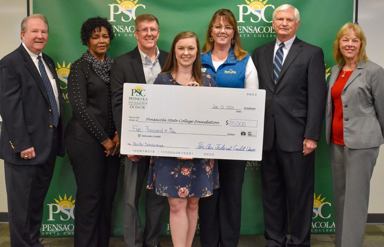 Pen Air donates $5,000 to Pensacola State College scholarship fund for student support.