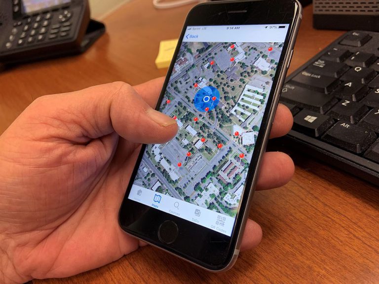 Mobile map feature on Pensacola State College smartphone app for campus navigation and course search.