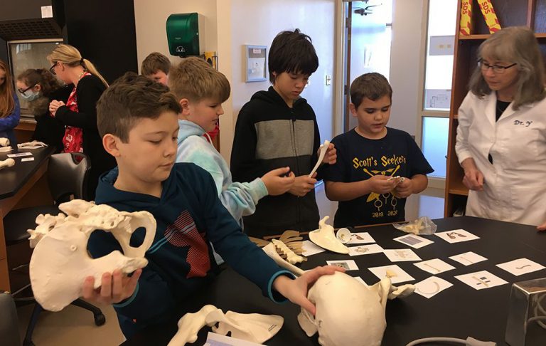 Students explore bones and learn about anatomy during educational field trip.