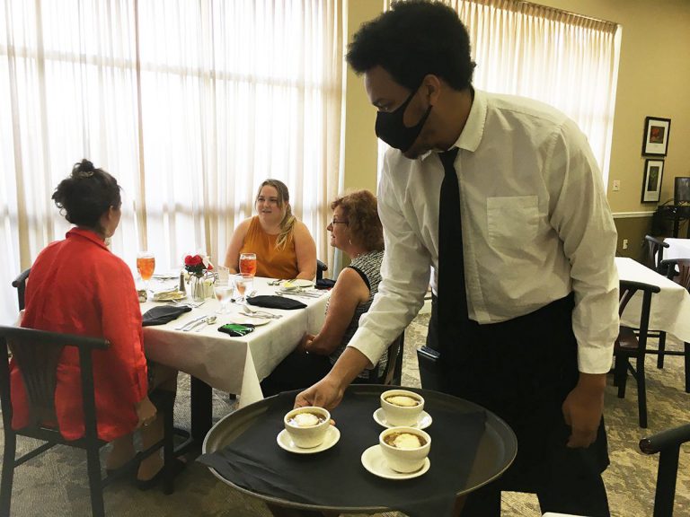 Culinary students serve gourmet dishes during PSC faculty and staff lunch event.