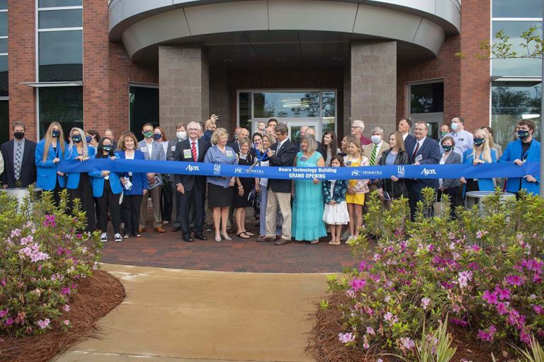 Newly unveiled Baars Technology Building at Pensacola State College during ribbon-cutting event.