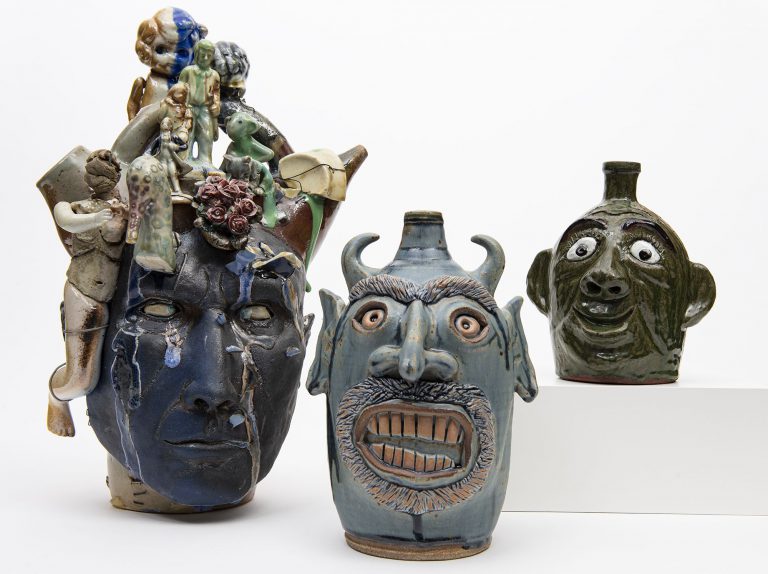 Folk pottery art exhibit showcasing Southern Appalachian influences and academic craftsmanship at Pe.