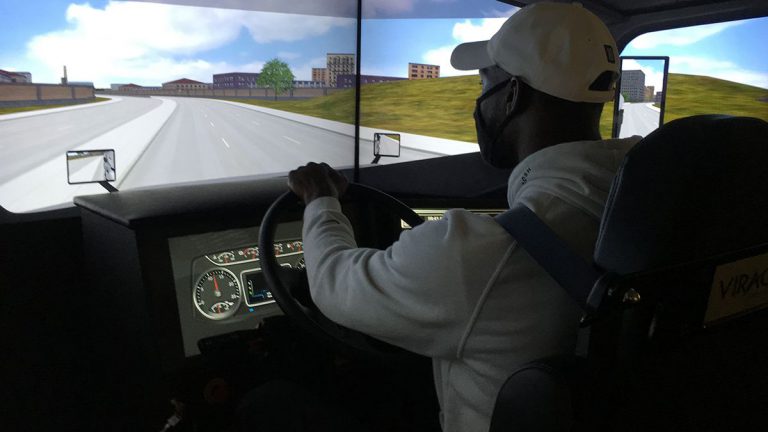 Commercial driving simulator for truck driver training at Pensacola State College.