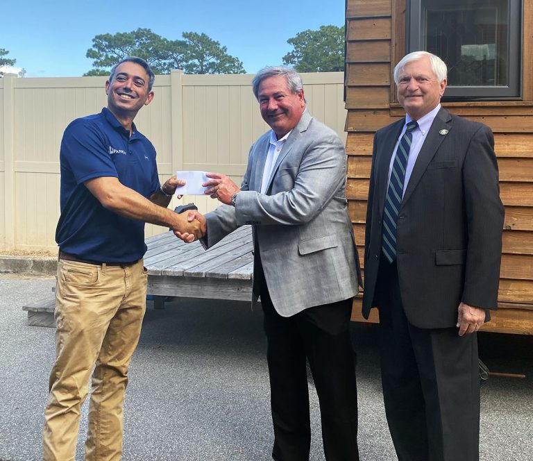 Scholarship Award Ceremony at PSC with Local Builder Scholarship presentation at Pensacola State College featuring local builder establishing Student Con.