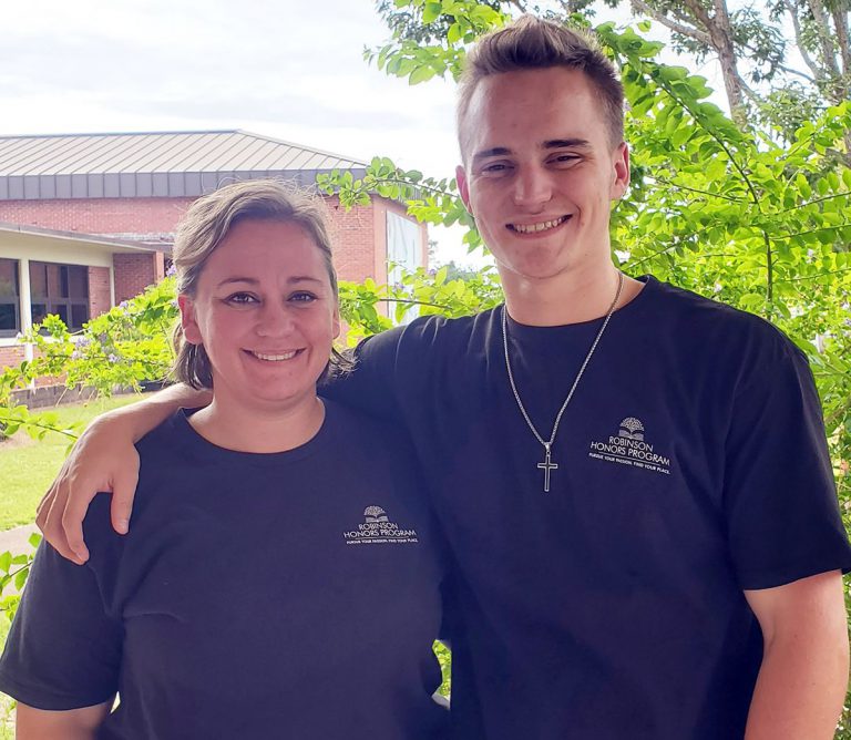 Honors Program Mom and Son at Pensacola State College Dedicated honors students celebrating academic excellence at Pensacola State College.