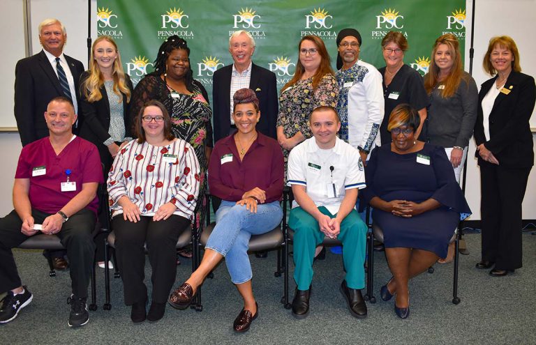 Inspiration and support for PSC scholarship recipients at Pensacola State College Diverse group of students and staff celebrating scholarship success and educational opportunities at.