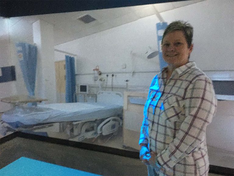 Virtual Healthcare Training in PSC Health Sciences Department Student engaging with virtual healthcare simulation in PSC Health Sciences Department.