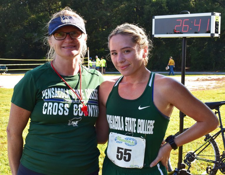 U.S. Marine Corps Sgt. Maria Tibbetts at Pensacola State College Cross Country meet Marine Sgt. Maria Tibbetts, PSC student-athlete, at cross country race, heading to national champion.