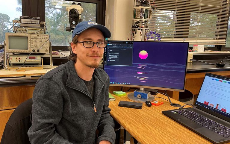 Particle Systems Engineering Student at Pensacola State College Engineering student working on particle systems for open house at Pensacola State College.