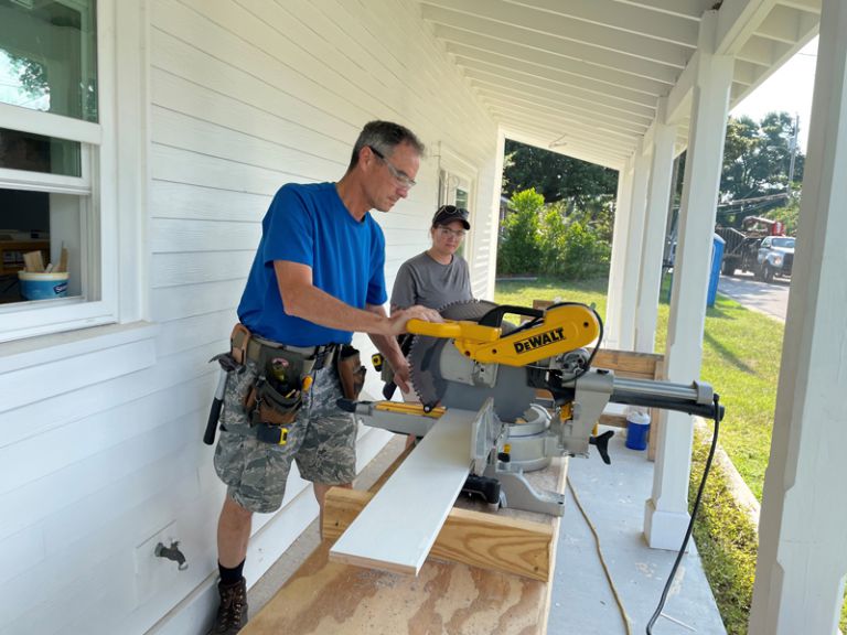 Carpentry students at Pensacola State College practicing construction technology skills with a DeWal.