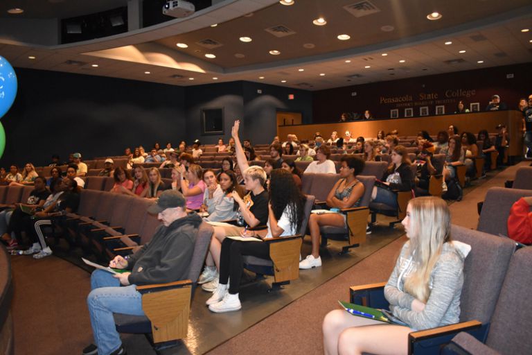 Orientation session with students at Pensacola State College auditorium.