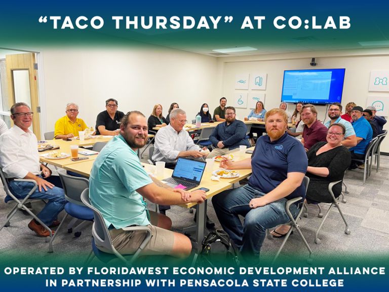 Group of entrepreneurs and small business owners participating in a workshop at Co:Lab, supported by.