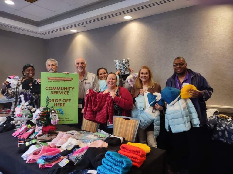 Pensacola State AFC Chapter Receives Platinum Award at 2022 Conference Highly visible image of Pensacola State College's AFC chapter members celebrating their Platinum Cha.