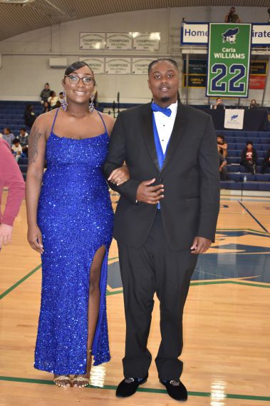 Celebrating homecoming with students dressed in formal wear at Pensacola State College.