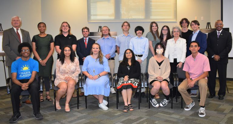 High school seniors from PSC Charter Academy discuss potential careers at Senior Symposium.