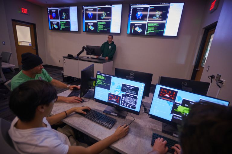 Cyber Defense Training at Pensacola State College Cybersecurity students engaging in advanced cyber defense exercises at Pensacola State College.