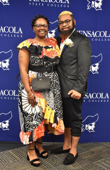 decorative image of Tyriq-Flowers-and-family-1-scaled , 2024-02-20 13:03:52