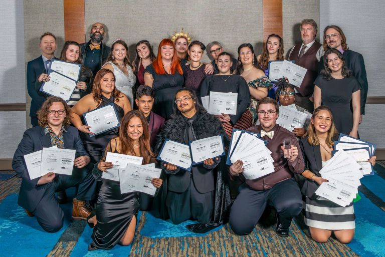 PSC Visual Arts Students Win Multiple Awards at Pensacola ADDY Gala Group of diverse students holding certificates at the Pensacola ADDY awards ceremony, celebrating th.