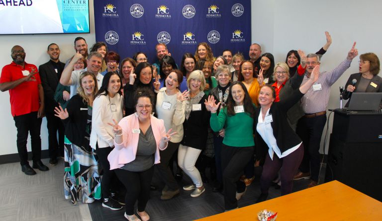 Inaugural Nonprofit Certification Program Class at Pensacola State College Diverse group of nonprofit professionals celebrating graduation from the first certification program.