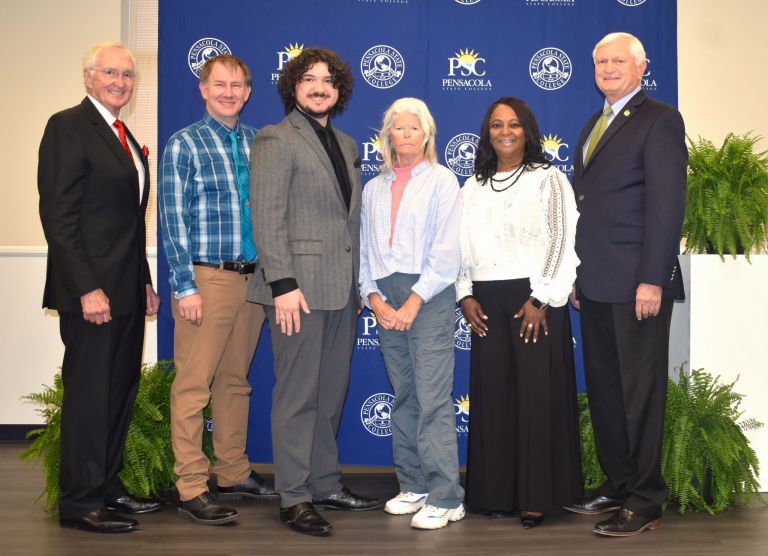 Recognizing Academy of Teaching Excellence Inductees at Pensacola State College Group photo of PSC faculty and administrators at the Academy of Teaching Excellence induction ceremo.