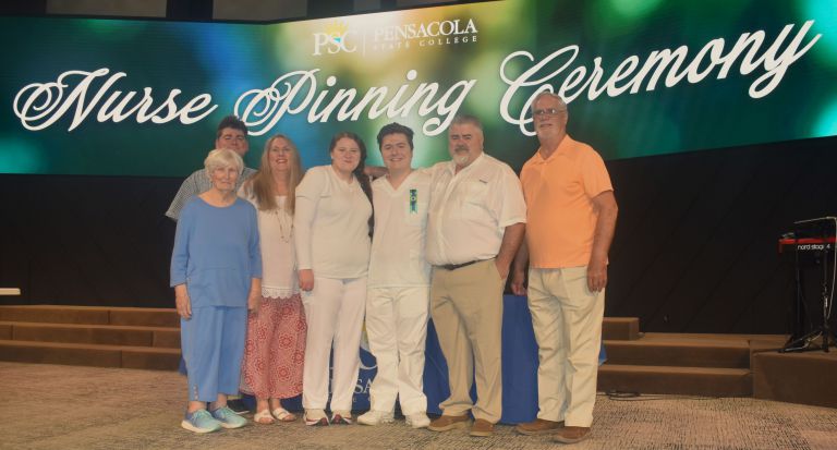 Nursing students and faculty at Pensacola State College pinning ceremony.