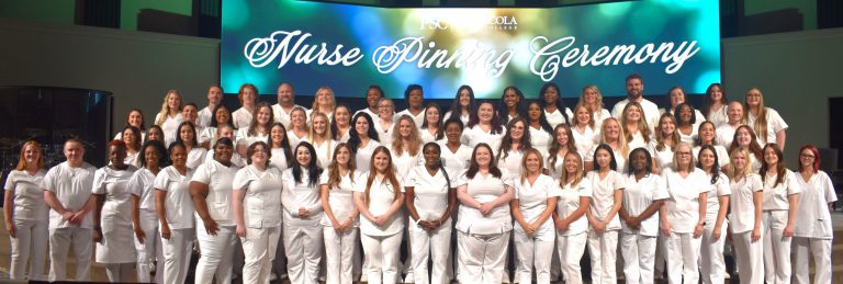 Nursing graduates honored at pinning ceremony celebrating academic achievement.