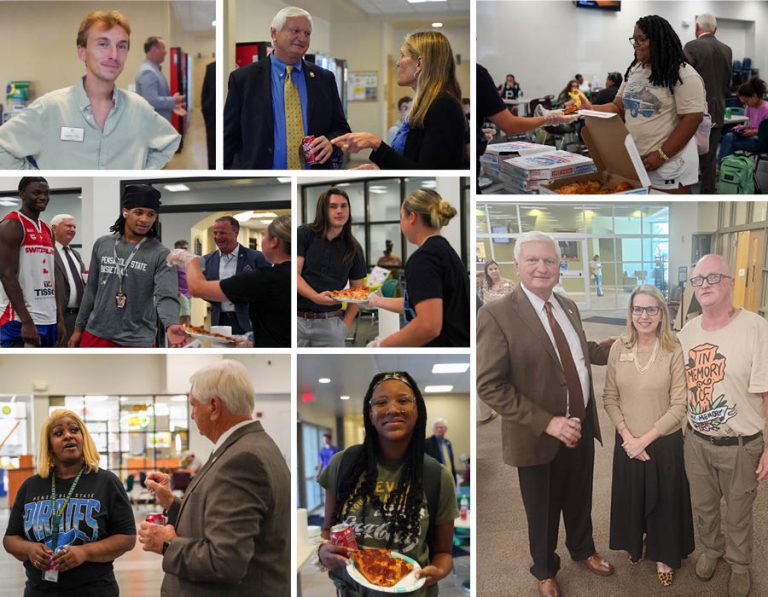 Celebrating student success and campus involvement during Pizza With the President event.