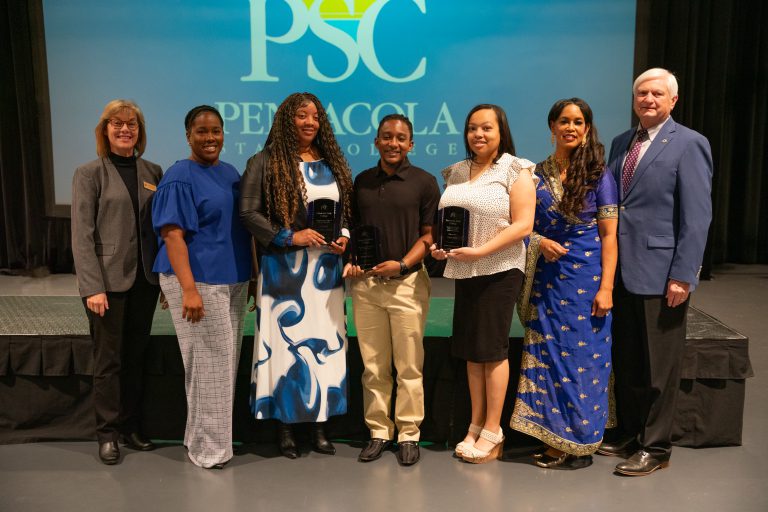 Group of Pensacola State College students receiving Dr. Garrett T. Wiggins endowed scholarships.
