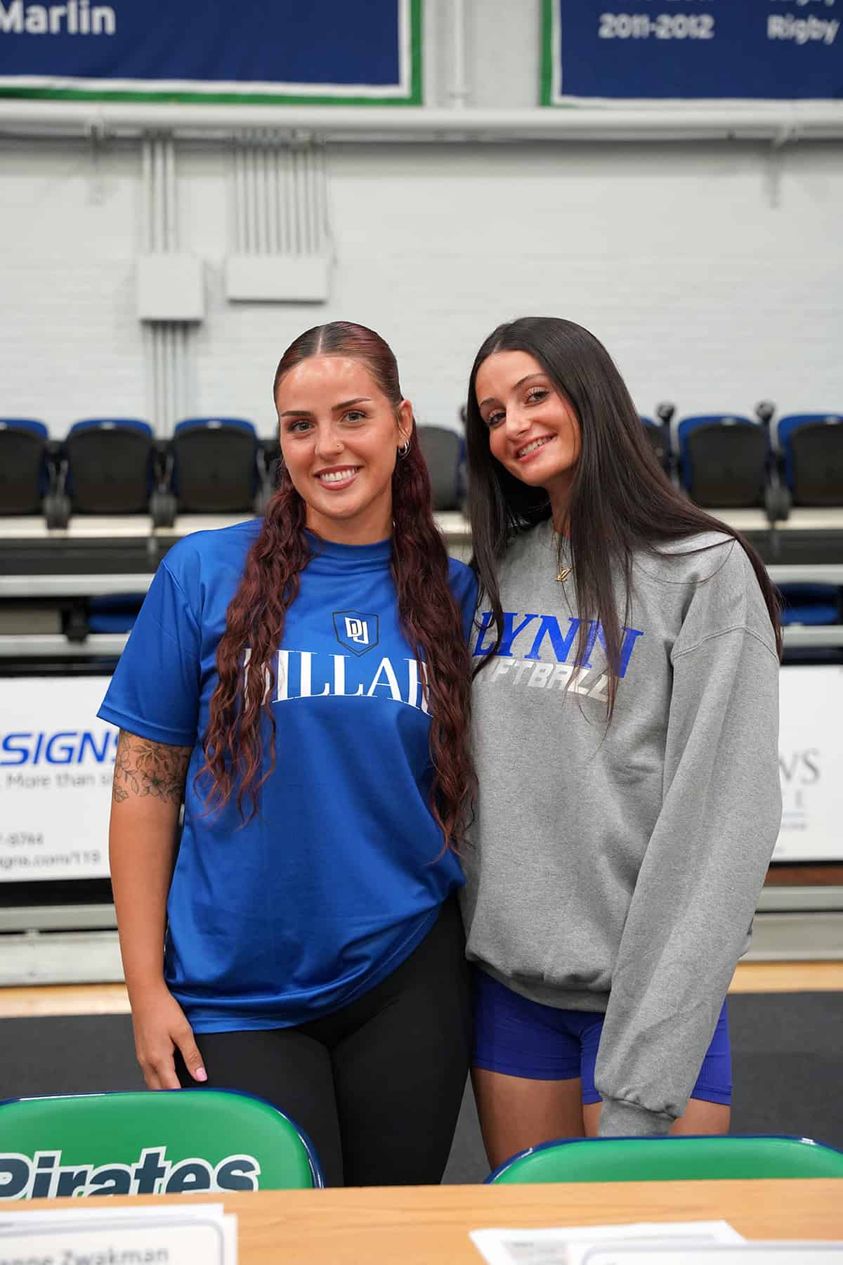 Image of student athletes on signing day.