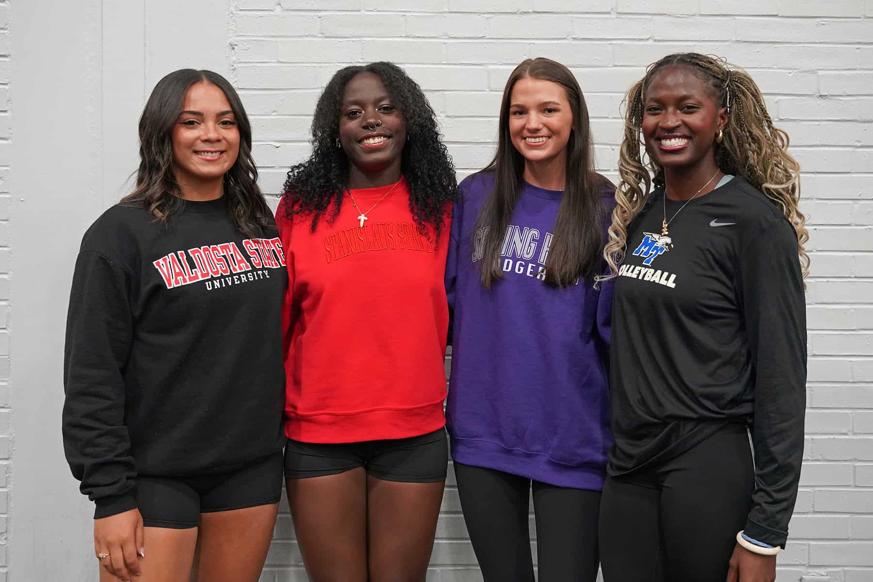 Picture of student athletes on signing day.