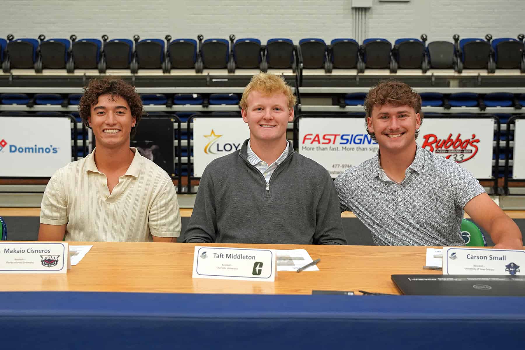 Picture of student athletes on signing day.