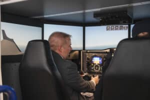 Kelly tests out flight simulator