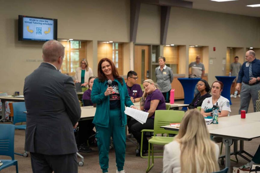 J. Kelly taking questions from greeting faculty, staff and students at Pensacola State College.