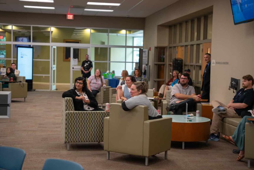 J. Kelly greeting faculty, staff and students.