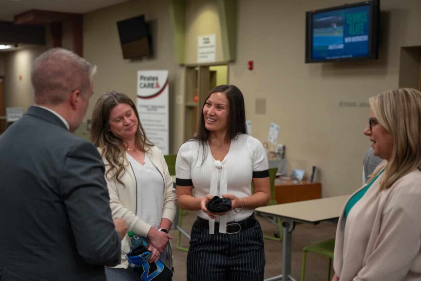J. Kelly greeting faculty, staff and students.